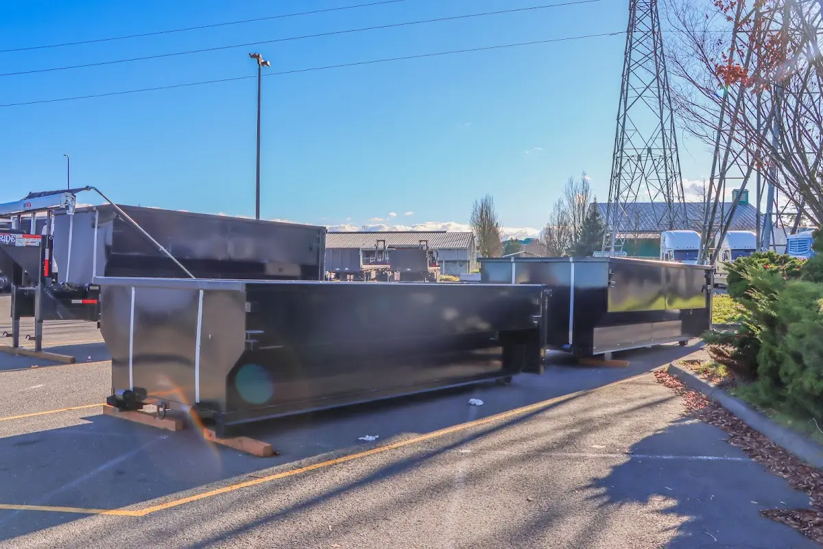 Roll-off dumpster ready for waste disposal at job site for 6 Yard Dumpster Rental in Tuskegee